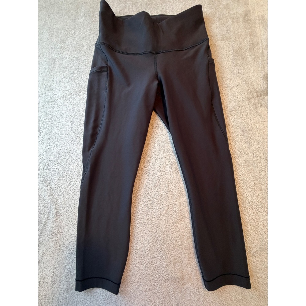 Athleta Salutation Stash Pocket II Capris Women Small Black High Rise Leggings